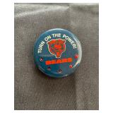  a vintage Chicago Bears "Turn On The Power!" NFL football pin back button, likely from the 1984 sea
