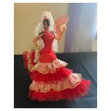 vintage Marin Chiclana Spanish flamenco dancer doll. The doll is dressed in a traditional red flamen