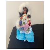 a vintage doll, possibly an Eskimo