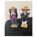 traditional Mexican folk art dolls, often referred to as "Maria" dolls or "Lele" dolls, which are po
