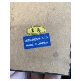 a vintage Japanese geisha or maiko doll, often associated with the traditional "Seven Hat Dance" 