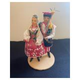 a pair of vintage, handmade Polish folk dolls. These collectibles are dressed in authentic regional 