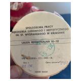 a pair of vintage, handmade Polish folk dolls. These collectibles are dressed in authentic regional 