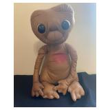 a vintage 1982 Kamar E.T. the Extra-Terrestrial plush doll. It was produced by Kamar International f
