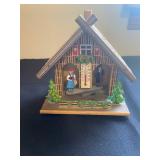 a vintage Toggili German Black Forest weather house, a functional weather predictor and collectible 