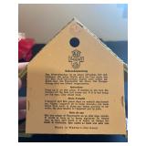 a vintage Toggili German Black Forest weather house, a functional weather predictor and collectible 