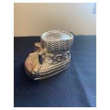  a vintage Leonard silver-plated baby bootie coin bank. 