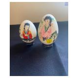  vintage hand-painted Chinese eggs, typically depicting ladies in a garden scene, displayed on small