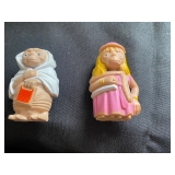 vintage E.T. the Extra-Terrestrial PVC mini-figurines, likely produced by LJN in 1982. 