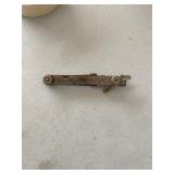 a vintage spark plug gap gauge and adjusting tool. 