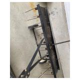 an Agri-Fab tow-behind lawn dethatcher. These dethatchers are designed to remove layers of thatch an