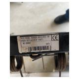 an Agri-Fab tow-behind lawn dethatcher. These dethatchers are designed to remove layers of thatch an