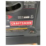 Craftsman 10-inch table saw with a stand