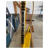 a vintage yellow Honda Kick 