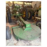 John Deere 127 rotary mower, also referred to as a gyro mower.  It is designed for cutting brush, we