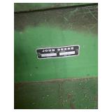 John Deere 127 rotary mower, also referred to as a gyro mower.  It is designed for cutting brush, we