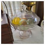 vintage glass compote dish with a lid features a crystal-clear design, a faceted knob handle, and a 
