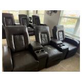 Home theater seating three (3) comfortable reclining seats with storage compartments and cup holders