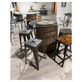 Rustic whiskey barrel bistro table topped with a circular glass surface
