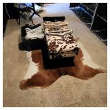 Storage Ottoman Bench featuring a brown and white cow print upholstery