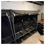 Portable black fabric wardrobe