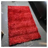 Chloe Collection area rug in a red shag style