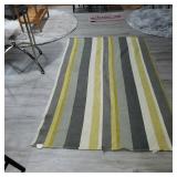 yellow, gray, and white striped area rug