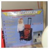Ride-on Carry-On toddler travel seat designed to attach to standard carry-on luggage