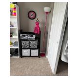 hot pink floor lamp and a miniature mannequin styled in a matching hot pink sequin dress