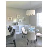Wall art, counter height stools and small dinette set.