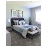 Bed, pillows, linen, wall art, home decor.