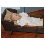 Vintage Primitive Style Solid Wood Handmade Doll Cradle.  Shown with a Vintage Composition Cloth Bod