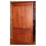 Hooker Furniture Co. Cherry Entertainment Armoire  (80”H x 43”W x 22”D). Doors slide to the inside o