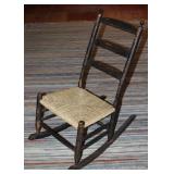Antique American Primitive Old Black Paint Ladies Rocker with Rush Seat Antique American Primitive Old Black Paint Ladies Rocker with Rush Seat