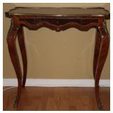 French Ladies’ Writing Desk with Ormolu Brass Mounts and Center Drawer. (32”W x 31.75”H x 19”D)