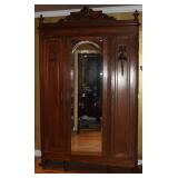 Antique 1880’s French Louis XVI  3-Door Armoire, with  Arched Bevel Mirror Center Door.  Arched Crow