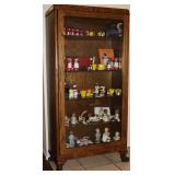 Antique Oak 5 Shelf Glass Door Front Cabinet (58 “Hx 30”W x 13”D) with Vintage Black Americana.  