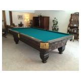 Brunswick 4' x 8' wood-carved pool table. Impeccable condition! Includes pool accessories.