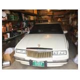 Arvada Egyptian Art and Designer Clothing with a Cadillac!