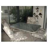 PATIO TABLE & 4 SWIVEL ROCKERS