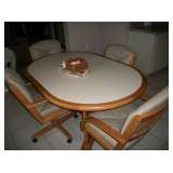 TABLE & 4 CASTOR CHAIRS