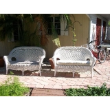 2 WICKER SETTEES