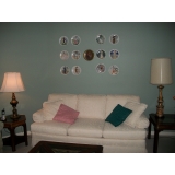 Robb & Stucky sofa, 12 Limoges plates