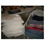 STACKS OF NAPKINS & TABLE CLOTHS