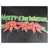 large X-mas sign lighted