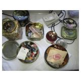 several tins of sewing buttons