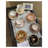 Tea Cart, Tea Cups, and Saucers