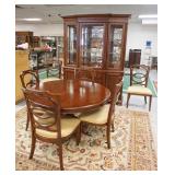 1011	BASSET DINING ROOM SET, BREAKFRONT, 53 IN ROUND TABLE W/ONE 24 IN LEAVE & A SET OF 6 CHAIRS	500