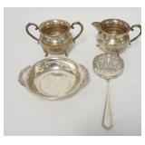 1064	4 PIECES OF STERLING SILVER, SMALL BOWL, CREAMER, SUGAR & SLOTTED SPOON, 9.71 TOZ TOTAL	200	300