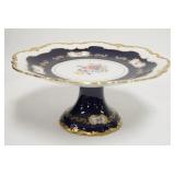 1101	EAST GERMAN DECORATED PORCELAIN CAKE PLATE  TRIMMED IN COBALT BLUE & GOLD. 13 IN DIAMETER 6 IN 